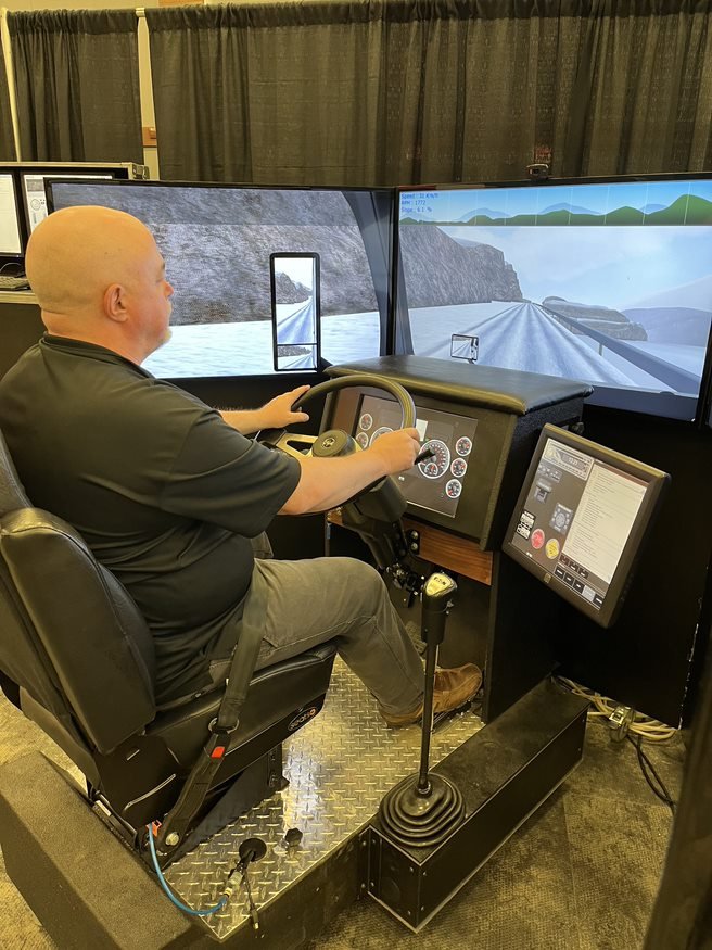 simulator traning driver is learning to drive on the truck driving simulator